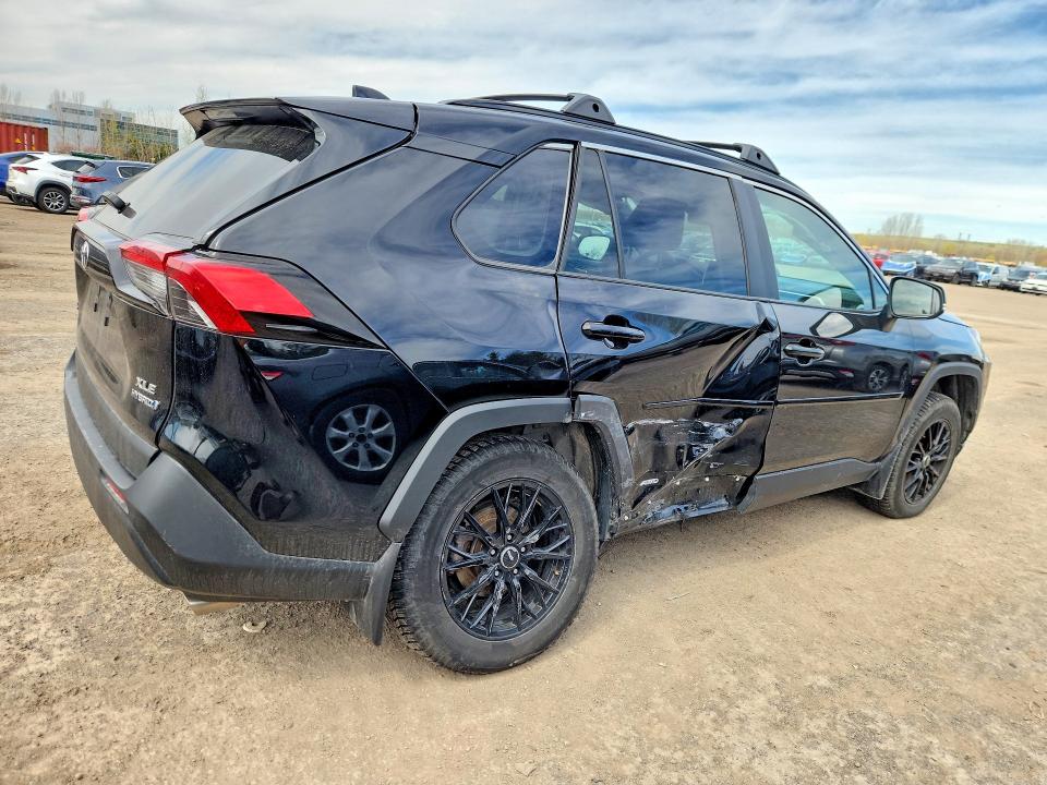2023 Toyota Rav4 hybrid VIN 2T3RWRFV9PW158954 COPART salvage auction — SIDE, On - Permit No Brand - Unfit, sold $17,400 on 2026-07-02 (photo 3)