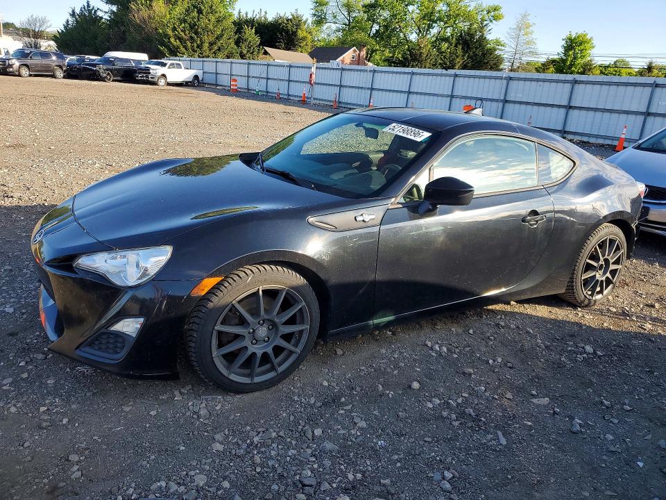 2015 Scion VIN JF1ZNAA16F9706146 COPART salvage auction — REAR END, Id - Salvage Certificate Of Title, sold $2,000 on 2026-07-06 (photo 1)