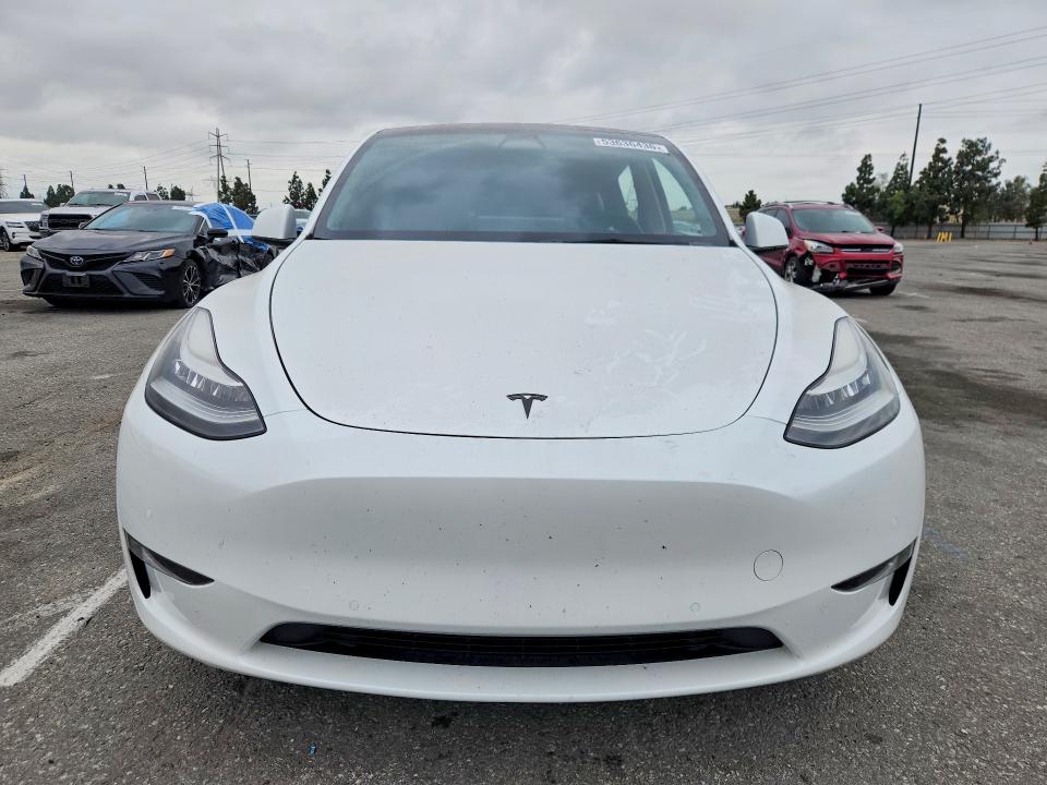 2021 Tesla Model y VIN 5YJYGDEE7MF299987 COPART salvage auction — SIDE, CA - SALVAGE CERTIFICATE, sold $150 on 2026-07-21 (photo 5)
