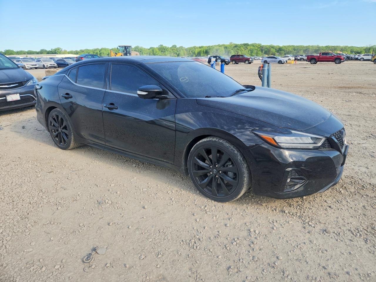 2023 Nissan Maxima VIN 1N4AA6EV1PC504970 COPART salvage auction — Hail, KS - CERT OF TITLE-SALVAGE, sold $12,100 on 2026-07-09 (photo 4)