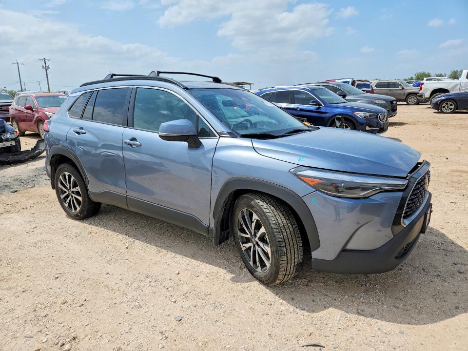 2024 Toyota Corolla cross VIN 7MUDAAAG4RV089622 COPART salvage auction — SIDE, Tx - Salvage Vehicle Title, sold $8,500 on 2026-07-16 (photo 4)