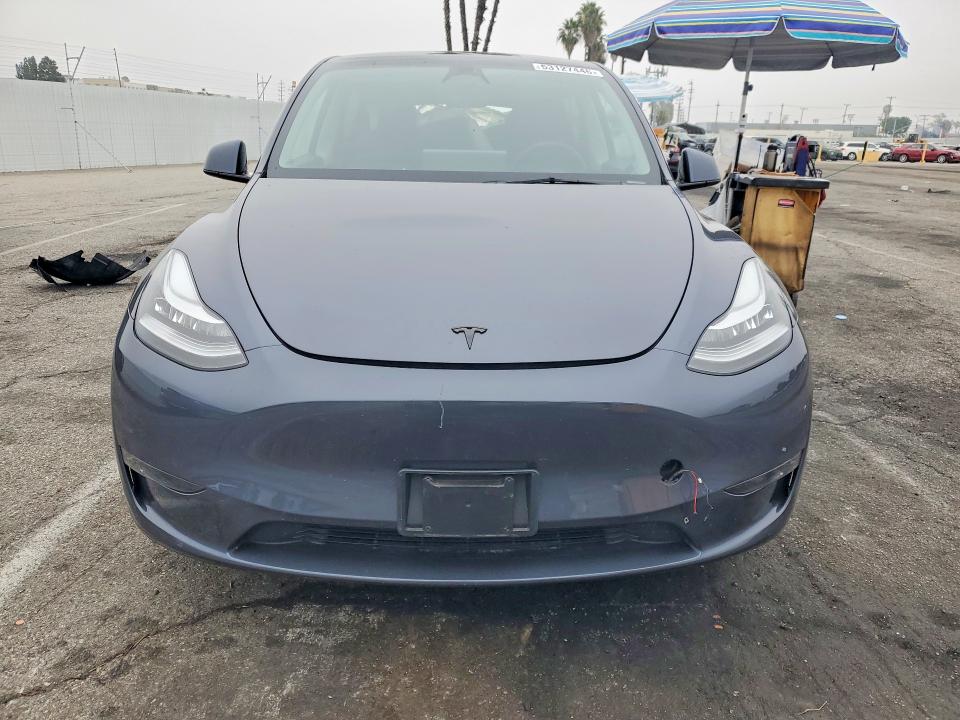 2023 Tesla Model y VIN 7SAYGDEE9PA113967 COPART salvage auction — REAR END, Ca - Salvage Certificate, sold $7,500 on 2026-07-17 (photo 5)