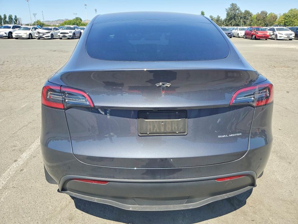 2023 Tesla Model y VIN 7SAYGDEE3PF873394 COPART salvage auction — SIDE, CA - SALVAGE CERTIFICATE, sold $13,200 on 2026-07-31 (photo 6)