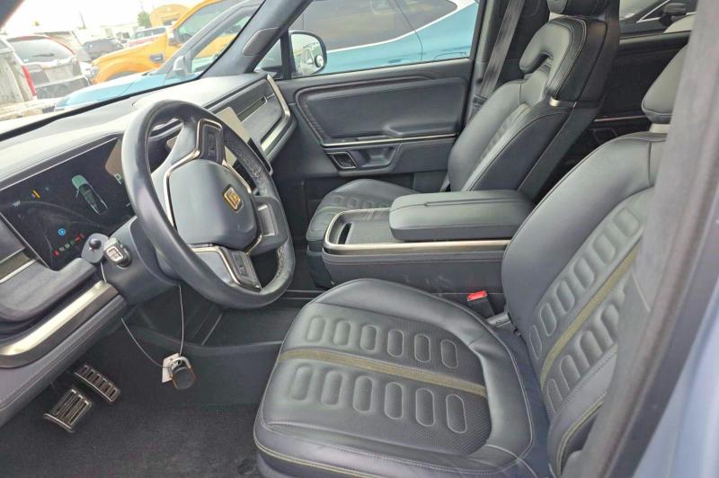 2023 Rivian R1s VIN 7PDSGABA4PN019950 COPART salvage auction — Normal Wear, MA - CERT OF TITLE-SALVAGE (P), sold $43,500 on 2026-06-08 (photo 7)