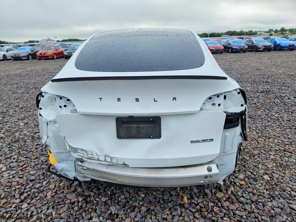 2023 Tesla Model y VIN 7SAYGDEE7PA141234 COPART salvage auction — REAR END, Mo - Salvage Certificate Of Title, sold $14,500 on 2026-07-27 (photo 6)