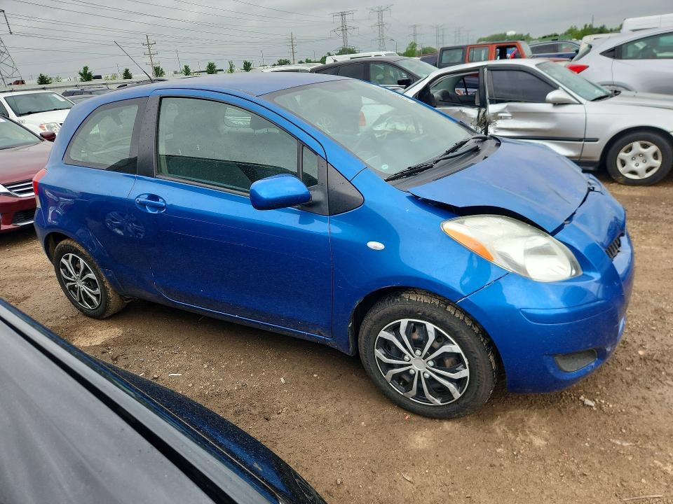 2011 Toyota Yaris VIN JTDJT4K39B5335256 COPART salvage auction — FRONT END, Il - Salvage Certificate, sold $775 on 2026-07-07 (photo 4)