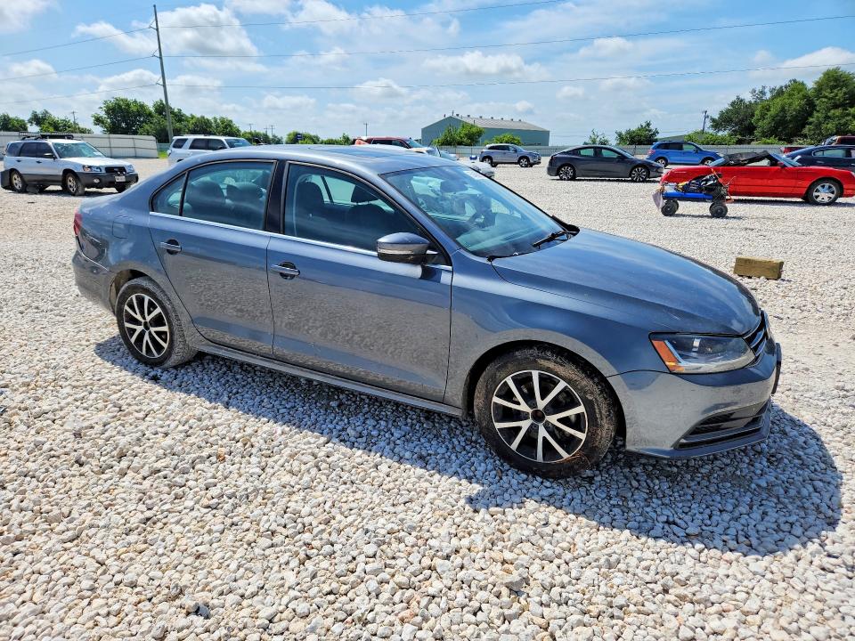 2018 Volkswagen Jetta VIN 3VWDB7AJ6JM223053 COPART salvage auction — SIDE, Tx - Salvage Vehicle Title, sold $350 on 2026-07-09 (photo 4)