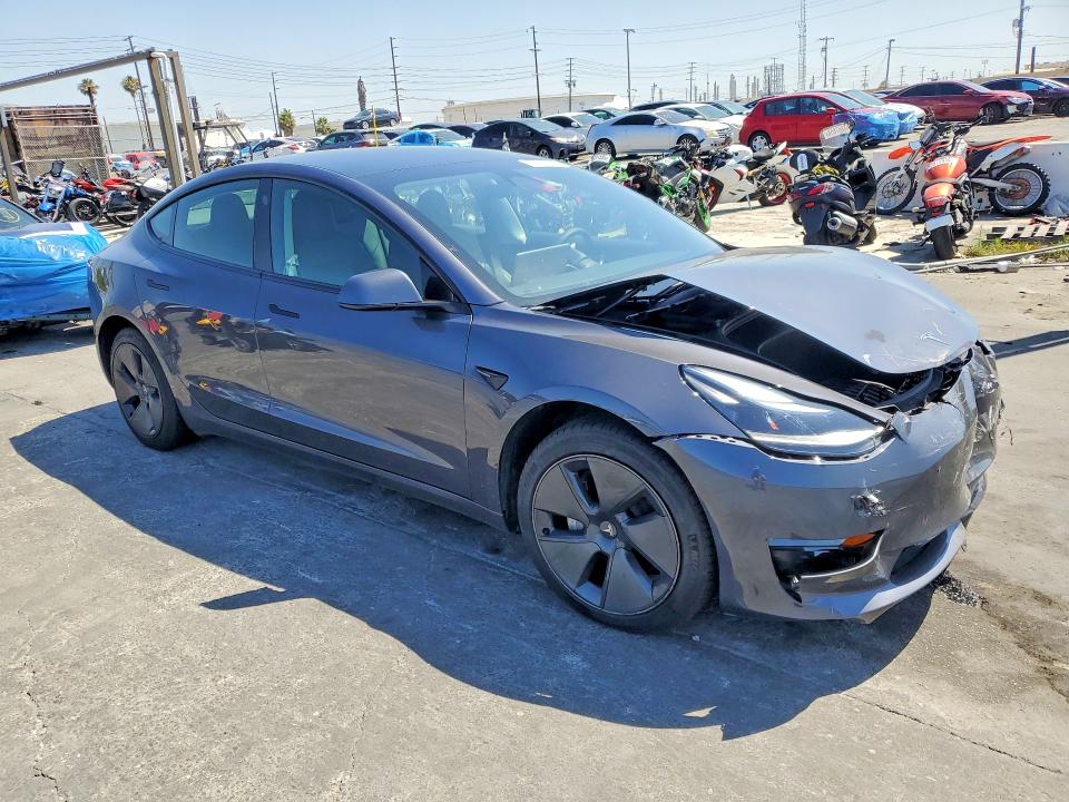 2023 Tesla VIN 5YJ3E1EA4PF664710 COPART salvage auction — FRONT END, Salvage Title, sold $9,000 on 2026-07-22 (photo 4)