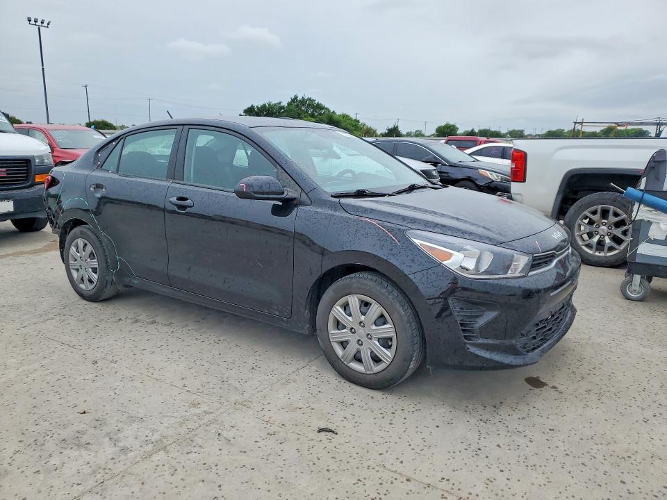 2023 Kia Rio VIN 3KPA24AD1PE598107 COPART salvage auction — REAR END, Tx - Salvage Vehicle Title, sold $4,400 on 2026-07-09 (photo 4)
