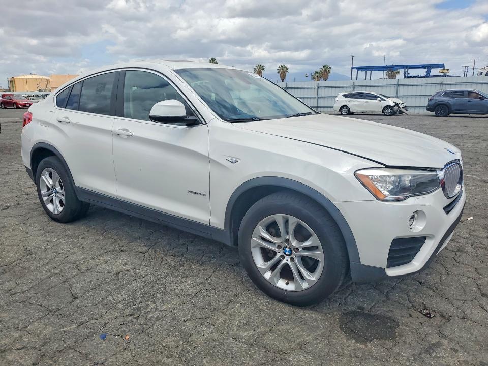 2015 BMW X4 VIN 5UXXW3C54F0M88334 COPART salvage auction — MECHANICAL, Fl - Certificate Of Title, sold $3,550 on 2026-07-16 (photo 4)