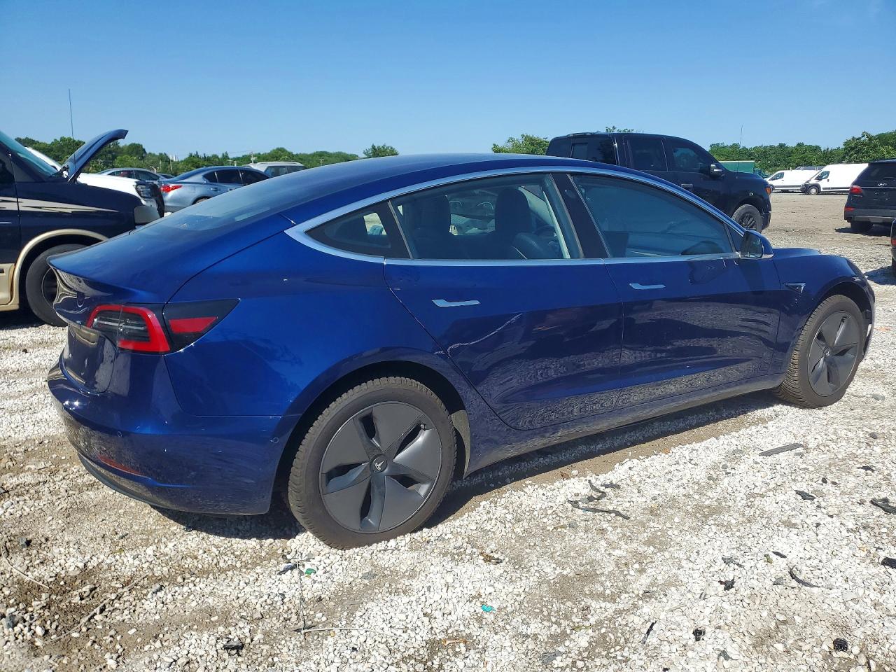 2018 Tesla Model 3 VIN 5YJ3E1EA6JF017006 COPART salvage auction — Side, MD - CERTIFICATE OF TITLE (P), sold $5,900 on 2026-07-03 (photo 3)