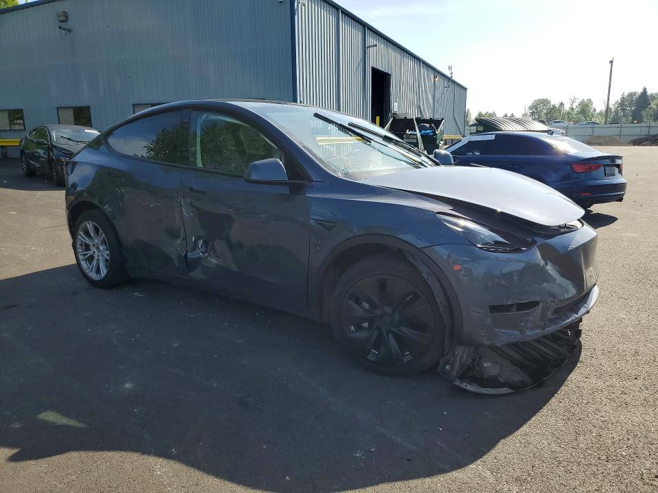 2023 Tesla Model y VIN 7SAYGDEE5PF645848 COPART salvage auction — SIDE, Or - Salvage Title Certificate, sold $6,400 on 2026-07-20 (photo 4)