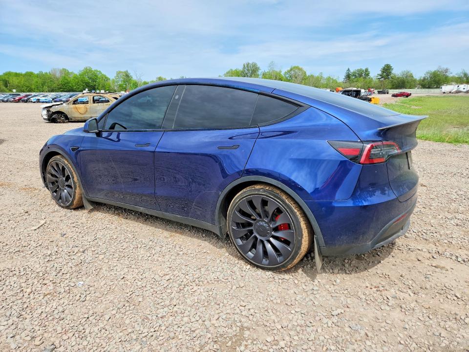 2023 Tesla Model y VIN 7SAYGDEF1PF856893 COPART salvage auction — SIDE, NY - MV-907A SALVAGE CERTIFICATE, sold $13,800 on 2026-07-06 (photo 2)