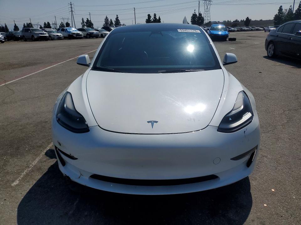 2023 Tesla Model 3 VIN 5YJ3E1EA0PF665515 COPART salvage auction — ALL OVER, CA - SALVAGE CERTIFICATE, sold $4,150 on 2026-07-16 (photo 5)