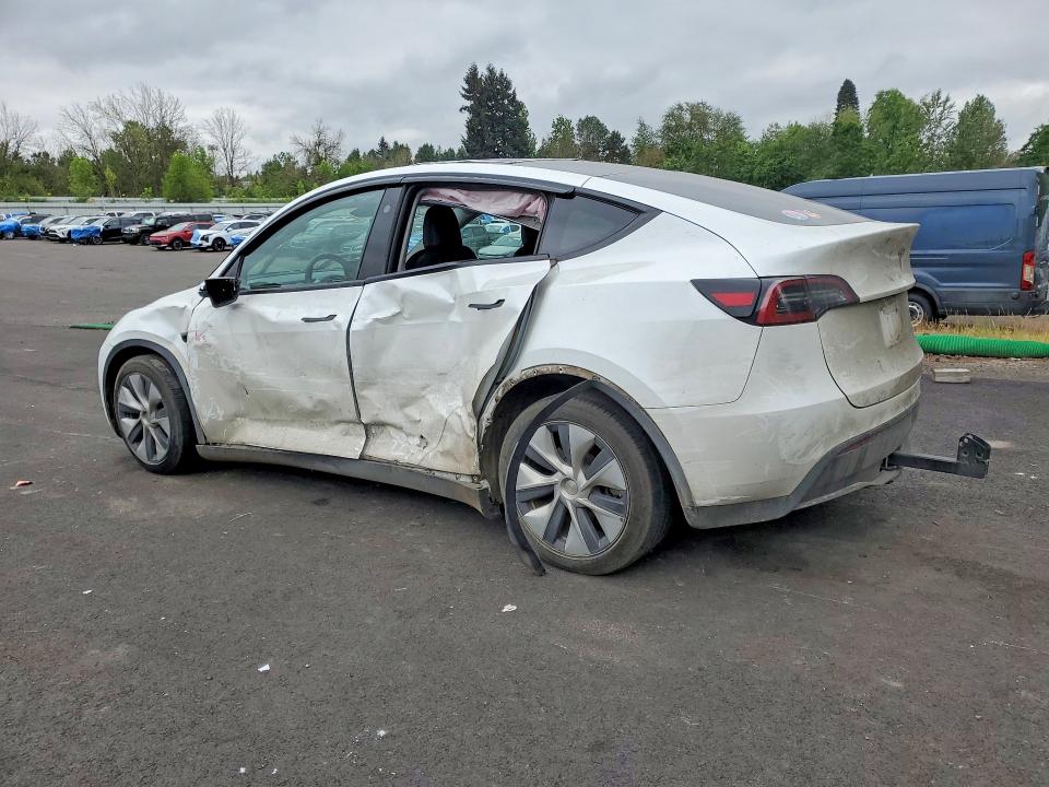 2023 Tesla Model y VIN 7SAYGDEE3PF909035 COPART salvage auction — SIDE, Or - Salvage Title Certificate, sold $8,000 on 2026-07-08 (photo 2)