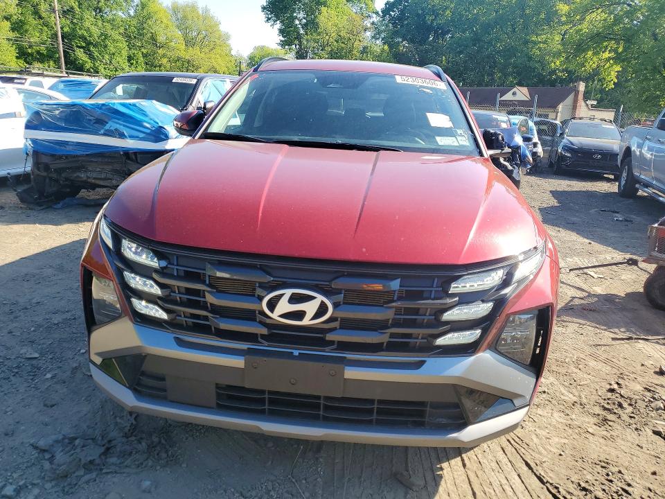 2025 Hyundai Tucson VIN 5NMJBCDE7SH545198 COPART salvage auction — SIDE, Fl - Cert Of Title Slvg Rebuildable, sold $12,300 on 2026-07-09 (photo 5)