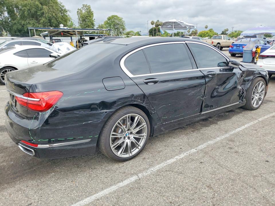 2016 BMW 7er VIN WBA7E2C52GG738741 COPART salvage auction — SIDE, Salvage Title, sold $8,100 on 2026-08-04 (photo 3)