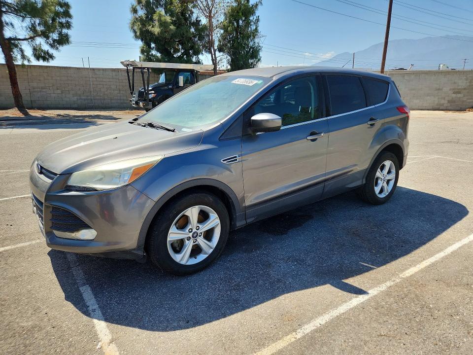 2014 Ford VIN 1FMCU0GX2EUD03118 COPART salvage auction — NORMAL WEAR, Ca - Dis/Dlr/Exp Only Clean Title, sold $975 on 2026-07-03 (photo 1)