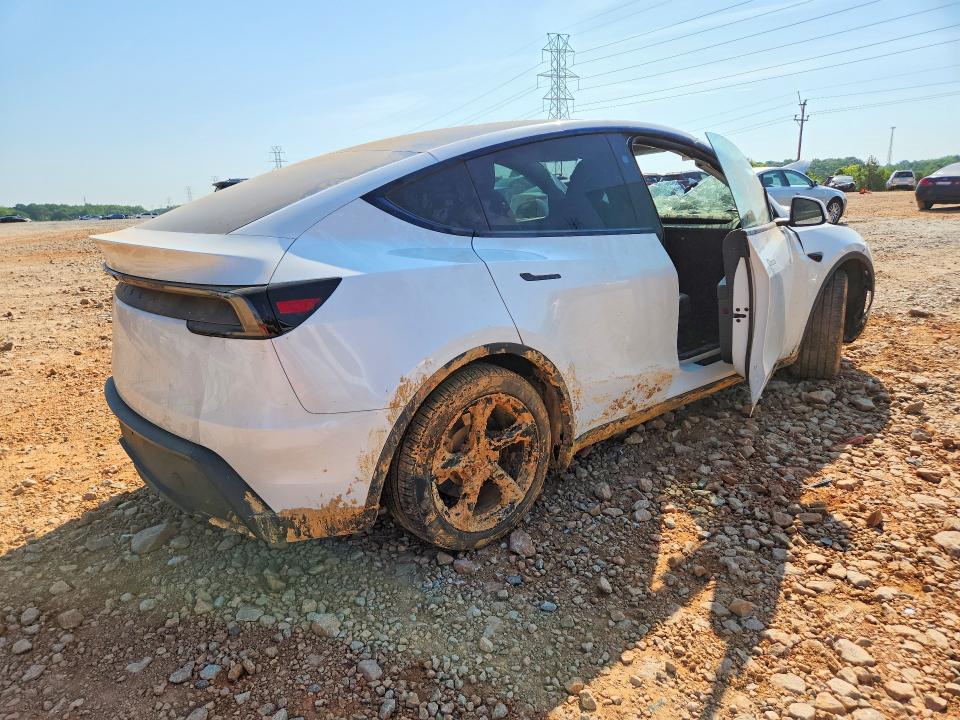 2026 Tesla VIN 7SAYGDED1TA431518 COPART salvage auction — WATER/FLOOD, Nc - Salvage Certificate Of Title, sold $1,700 on 2026-07-27 (photo 3)