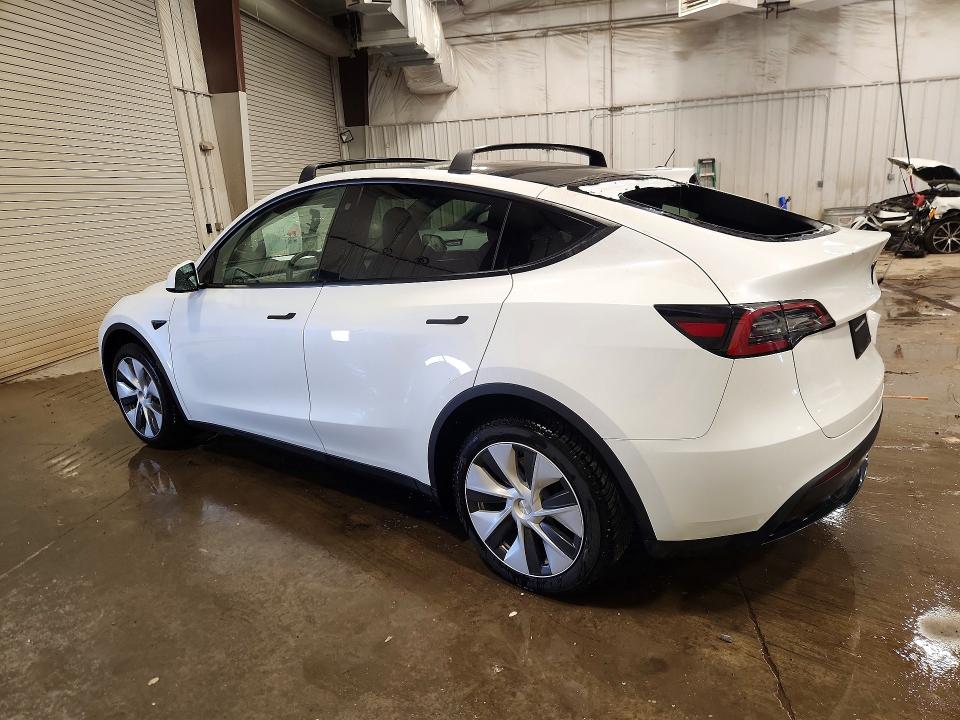 2023 Tesla VIN 7SAYGDEE9PF714007 COPART salvage auction — HAIL, Salvage Title, sold $12,000 on 2026-07-20 (photo 2)