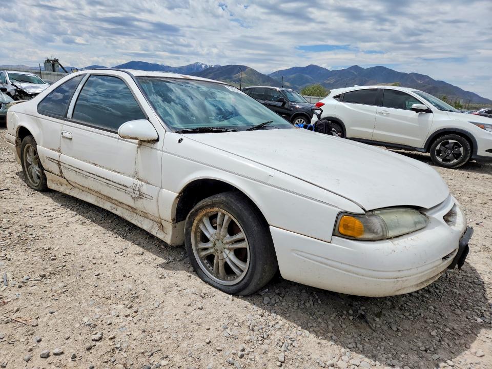 1997 Ford Thunderbird VIN 1FALP62W9VH148577 COPART salvage auction — MECHANICAL, Ut - Certificate Of Title, sold $650 on 2026-07-09 (photo 4)