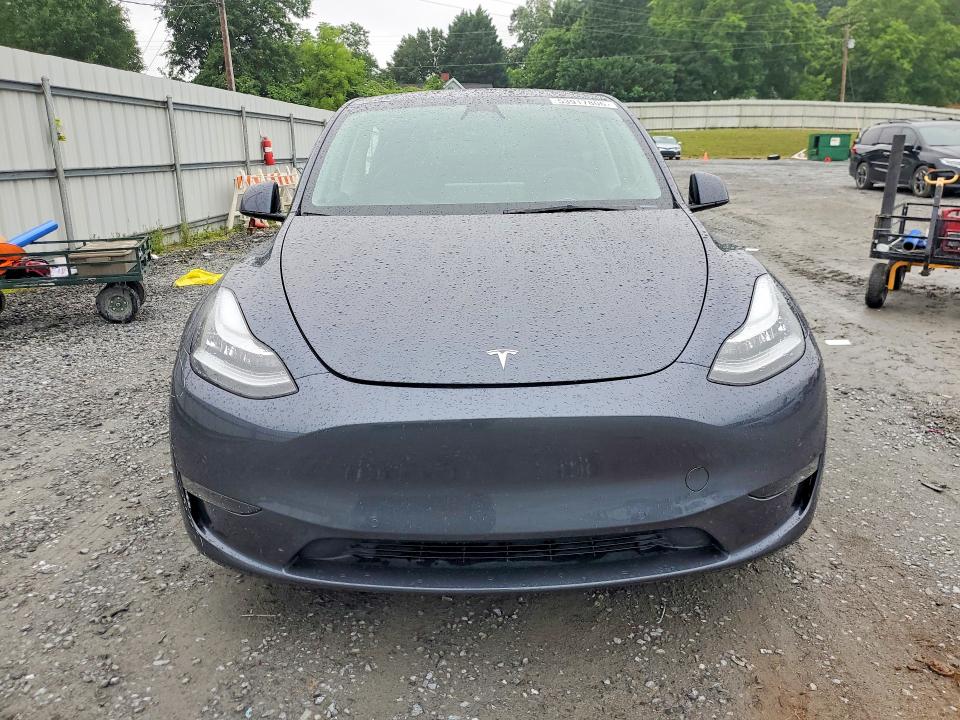 2022 Tesla Model y VIN 7SAYGDEE1NA015450 COPART salvage auction — REAR END, Nc - Salvage Certificate Of Title, sold $4,550 on 2026-07-29 (photo 5)