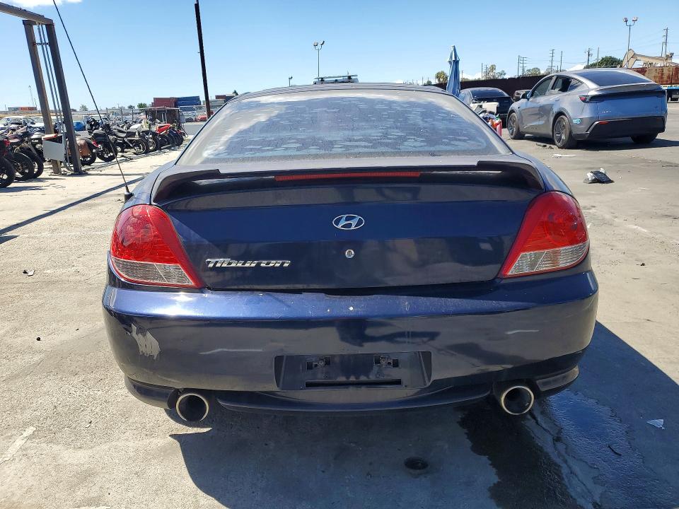 2005 Hyundai Tiburon VIN KMHHM65D95U157351 COPART salvage auction — FRONT END, CA - SALVAGE CERTIFICATE, sold $175 on 2026-07-24 (photo 6)