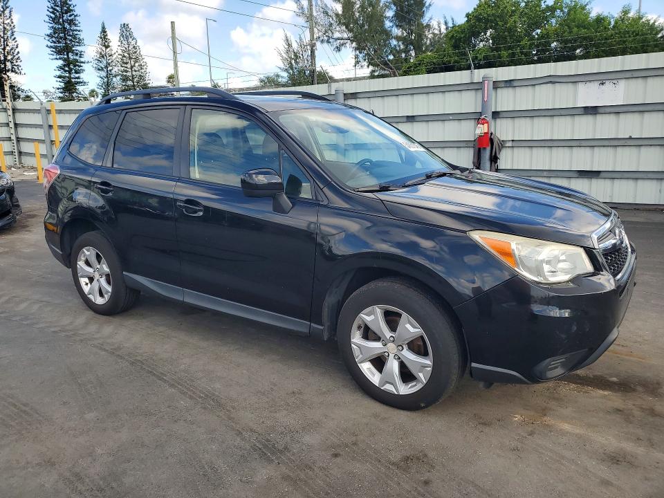 2014 Subaru Forester VIN JF2SJAEC8EH467868 COPART salvage auction — MINOR DENT/SCRATCHES, FL - CERTIFICATE OF TITLE, sold $975 on 2026-07-27 (photo 4)