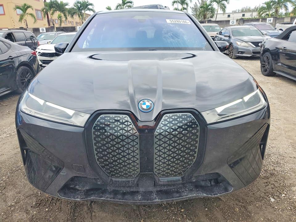 2025 BMW Ix VIN WB523CF0XSCS28531 COPART salvage auction — REAR END, Fl - Cert Of Title Slvg Rebuildable, sold $17,400 on 2026-08-28 (photo 5)