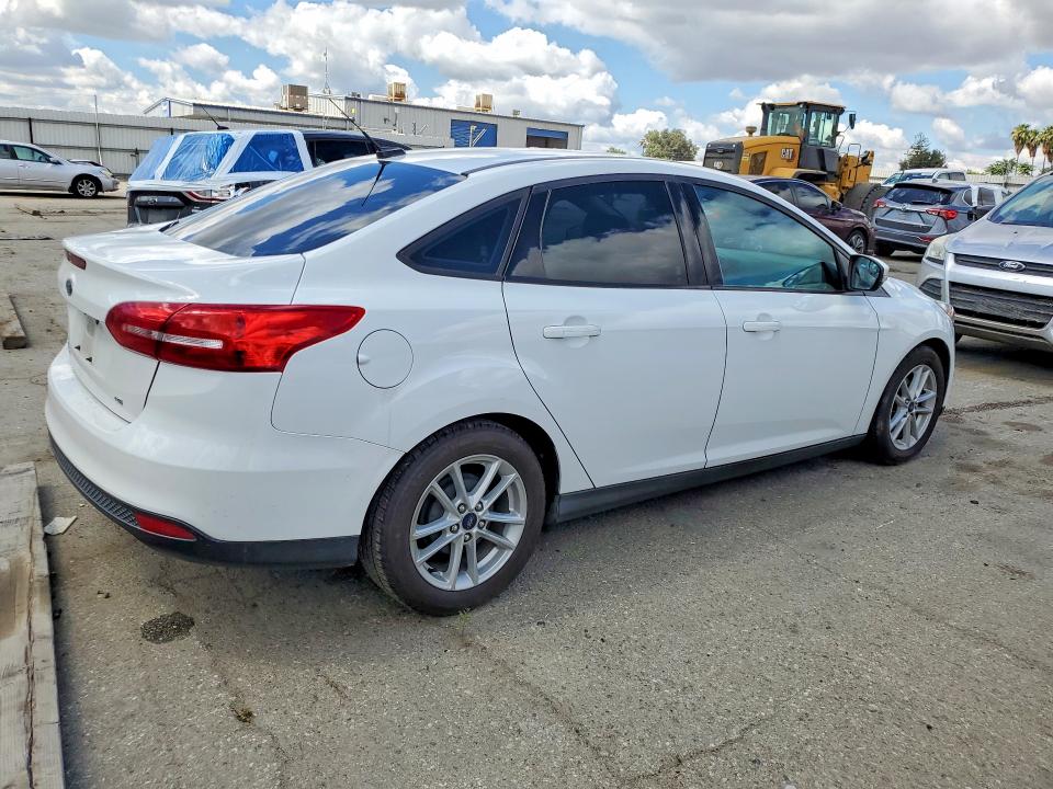 2017 Ford Focus VIN 1FADP3F28HL223183 COPART salvage auction — SIDE, Salvage Title, sold $800 on 2026-07-10 (photo 3)