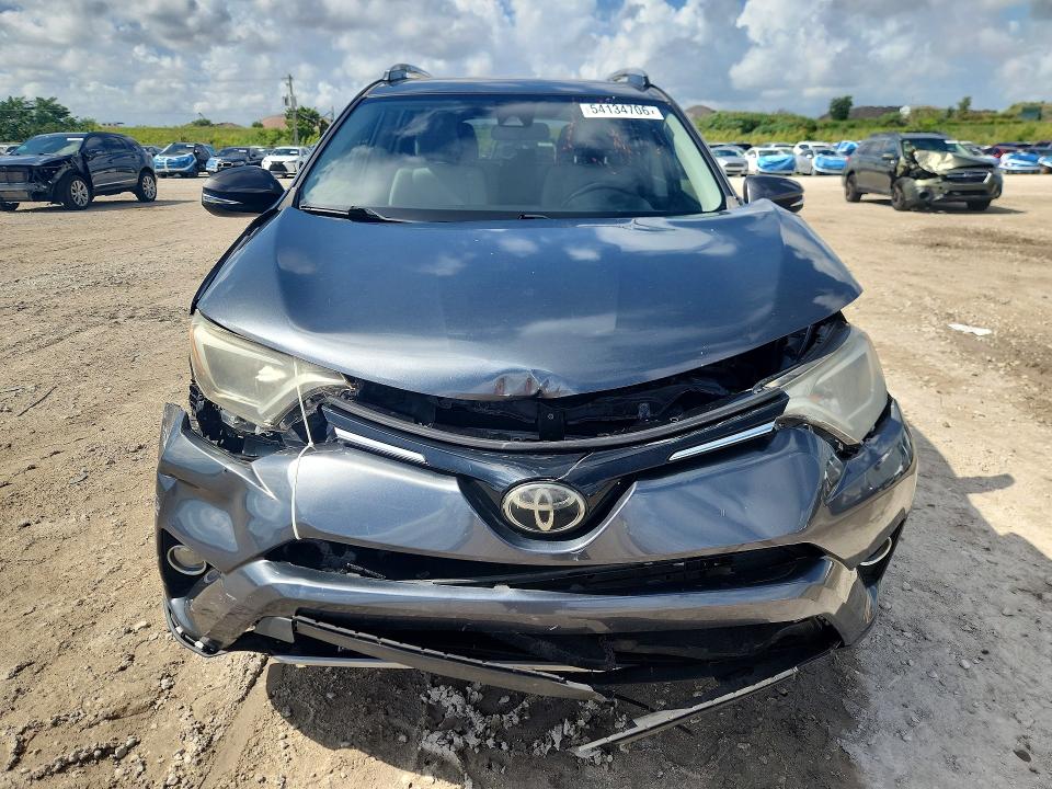 2018 Toyota Rav 4 VIN JTMWFREV8JD132354 COPART salvage auction — FRONT END, Fl - Cert Of Title Slvg Rebuildable, sold $5,800 on 2026-07-09 (photo 5)