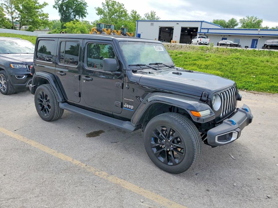 2023 Jeep Wrangler / VIN 1C4JJXP64PW513537 COPART salvage auction — MINOR DENT/SCRATCHES, Mo - Certificate Of Title, sold $21,000 on 2026-07-02 (photo 4)