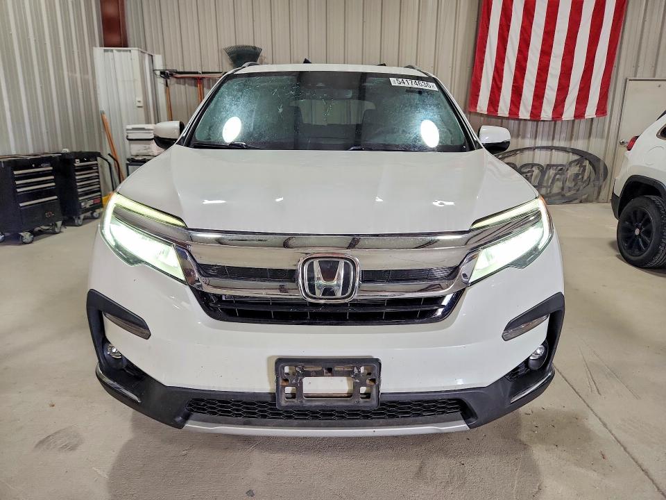 2020 Honda Pilot VIN 5FNYF6H01LB063994 COPART salvage auction — HAIL, Tx - Certificate Of Title, sold $14,700 on 2026-07-24 (photo 5)