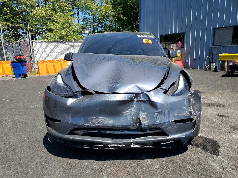 2023 Tesla Model y VIN 7SAYGAEE0PF589025 COPART salvage auction — FRONT END, Or - Salvage Title Certificate, sold $500 on 2026-07-29 (photo 5)
