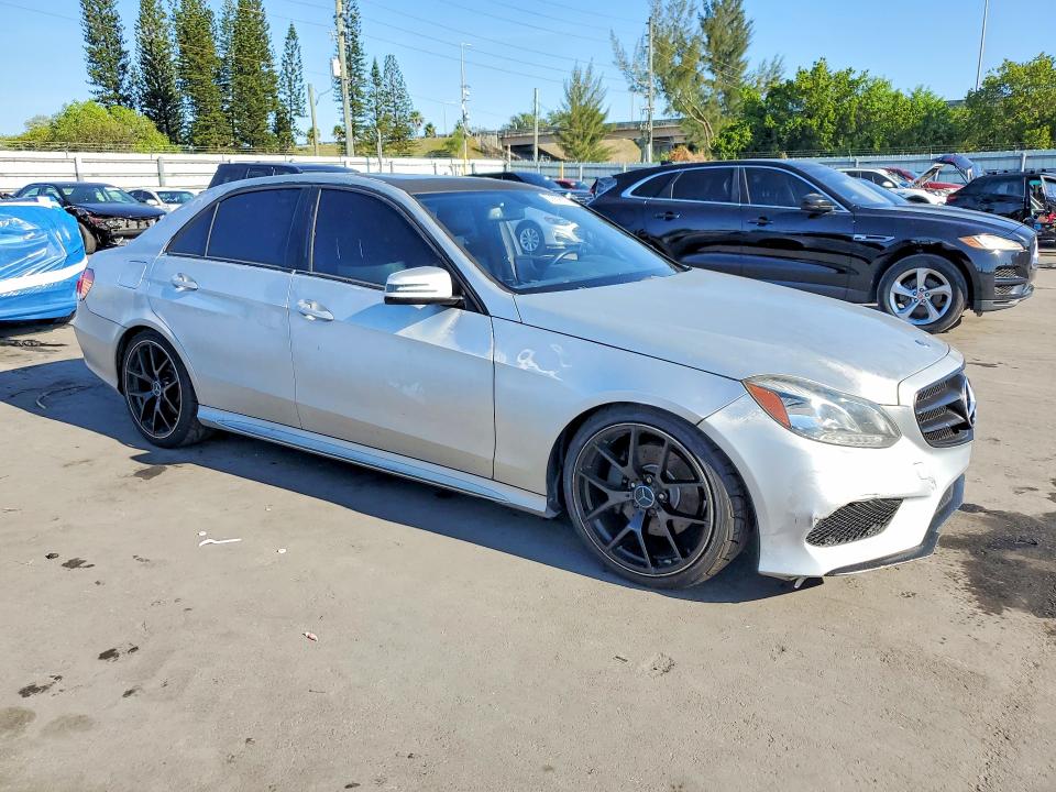 2014 Mercedes-benz VIN WDDHF5KB1EA818566 COPART salvage auction — SIDE, Fl - Cert Of Title Slvg Rebuildable, sold $2,050 on 2026-08-05 (photo 4)