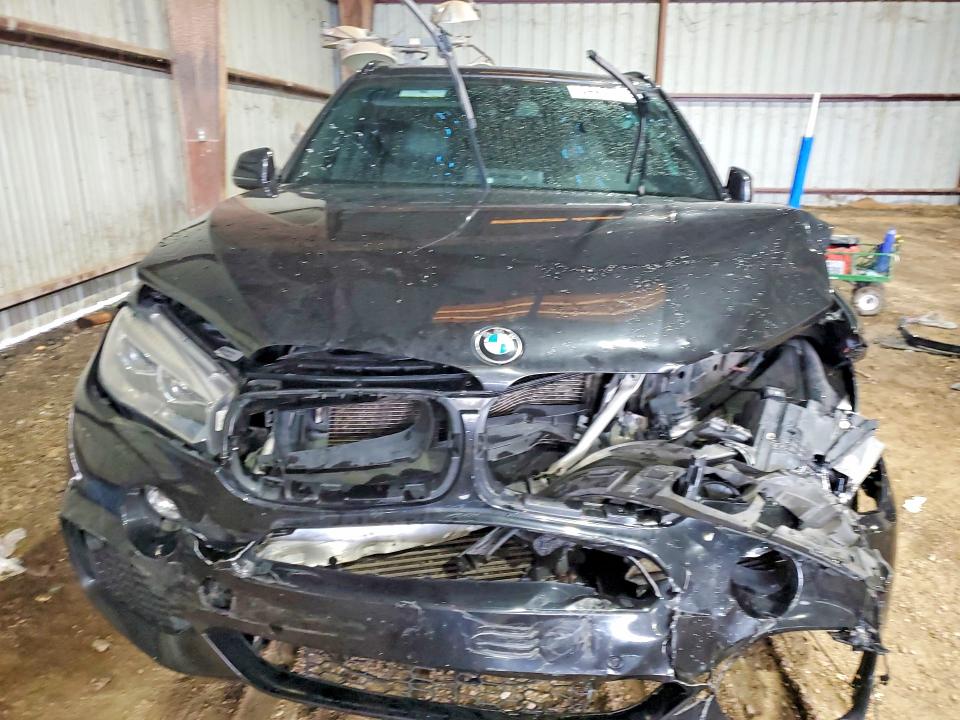 2014 BMW VIN 5UXKR0C54E0H18486 COPART salvage auction — FRONT END, TX - SALVAGE VEHICLE TITLE, sold $100 on 2026-07-27 (photo 5)