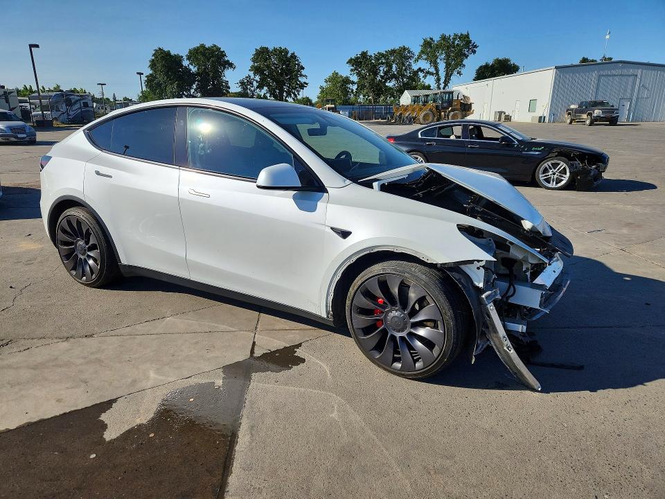 2024 Tesla Model y VIN 7SAYGDEF1RF181551 COPART salvage auction — FRONT END, Ca - Salvage Certificate, sold $13,100 on 2026-07-13 (photo 4)