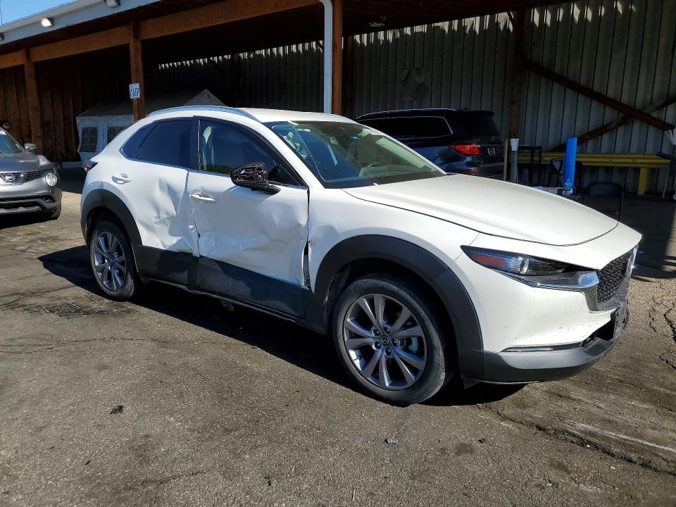 2023 Mazda Cx-30 VIN 3MVDMBCM3PM559824 COPART salvage auction — SIDE, Co - Public - Salvage Title, sold $5,900 on 2026-07-09 (photo 4)