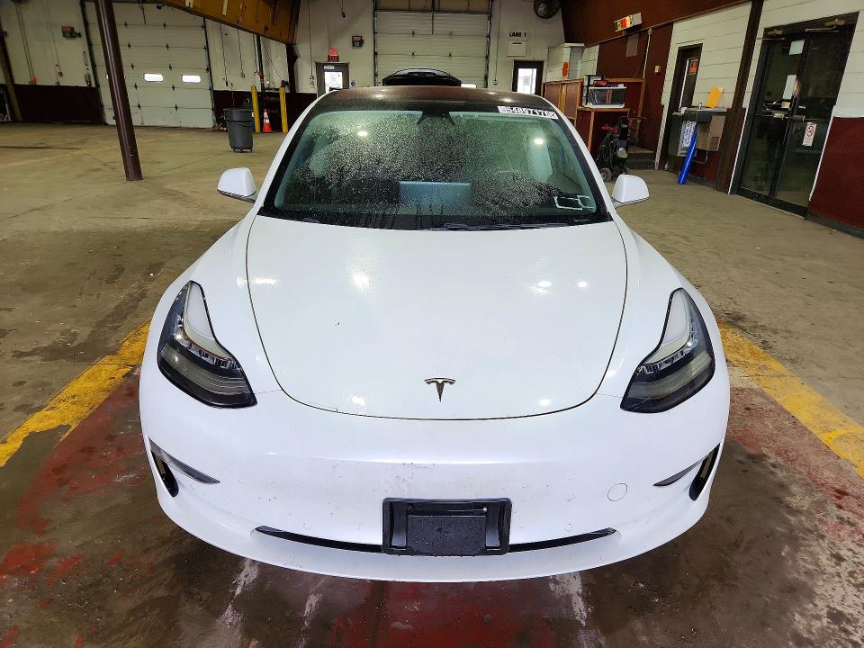 2018 Tesla Model 3 VIN 5YJ3E1EA1JF126506 COPART salvage auction — SIDE, Wv - Certificate Of Title, sold $6,500 on 2026-07-23 (photo 5)