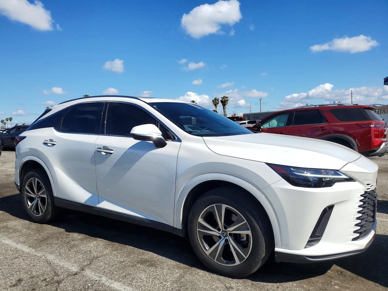 2024 Lexus RX 350 VIN JTJCHMAA7R2017221 COPART salvage auction — Side, CA - SALVAGE CERTIFICATE, sold $25,750 on 2026-07-10 (photo 4)
