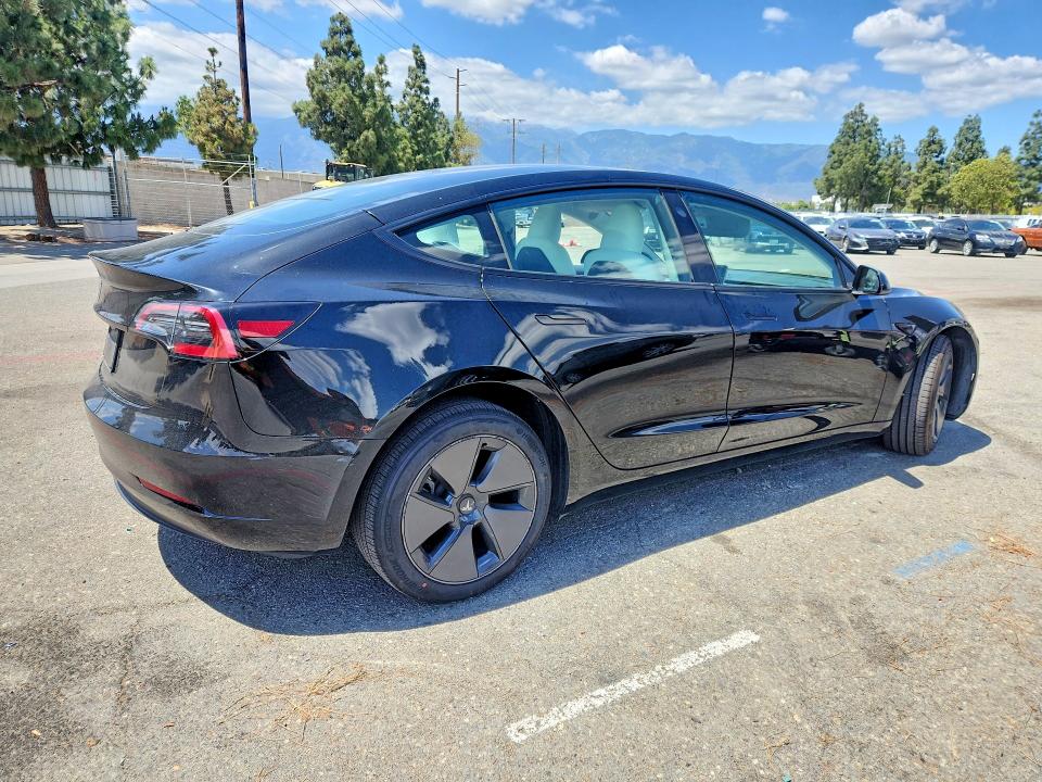 2023 Tesla Model 3 VIN 5YJ3E1EAXPF581783 COPART salvage auction — REAR END, CA - SALVAGE CERTIFICATE, sold $8,200 on 2026-07-21 (photo 3)