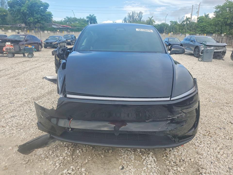 2026 Tesla Model y VIN 7SAYGDED0TA655752 COPART salvage auction — SIDE, Fl - Certificate Of Destruction, sold $6,600 on 2026-07-28 (photo 5)