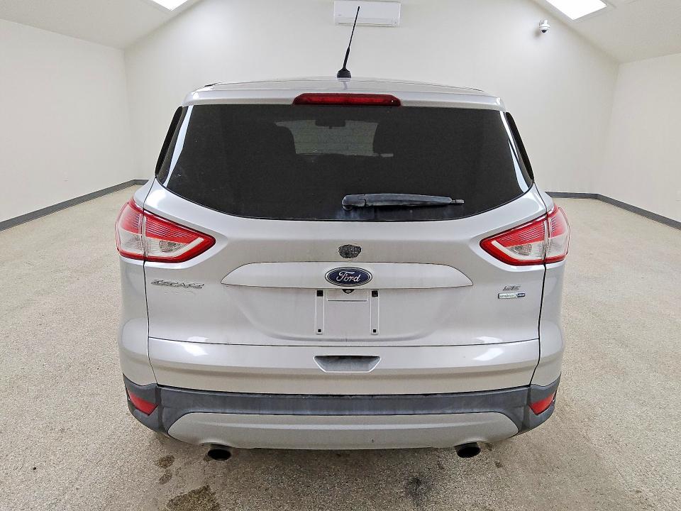 2014 Ford Escape VIN 1FMCU9G9XEUC09574 COPART salvage auction — NORMAL WEAR, Nm - Certificate Of Title, sold $825 on 2026-07-09 (photo 6)