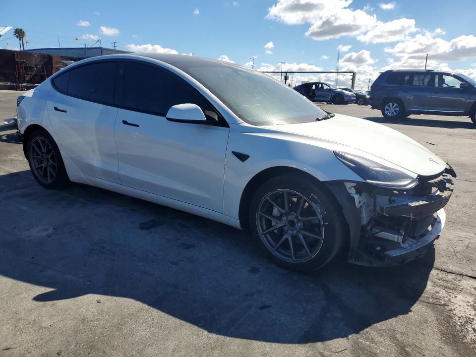 2023 Tesla Model 3 VIN 5YJ3E1EA3PF504298 COPART salvage auction — FRONT END, Ca - Salvage Certificate, sold $8,800 on 2026-07-10 (photo 4)
