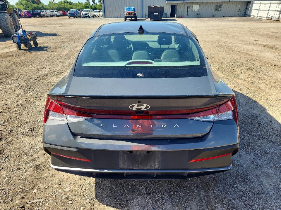 2025 Hyundai Elantra VIN KMHLM4DG2SU059090 COPART salvage auction — SIDE, Tx - Salvage Vehicle Title, sold $5,000 on 2026-07-22 (photo 6)