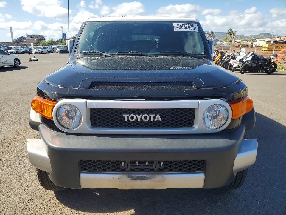2011 Toyota Fj cruiser VIN JTEBU4BF8BK109539 COPART salvage auction — WATER/FLOOD, Hi - Certificate Of Salvage, sold $1,600 on 2026-07-27 (photo 5)