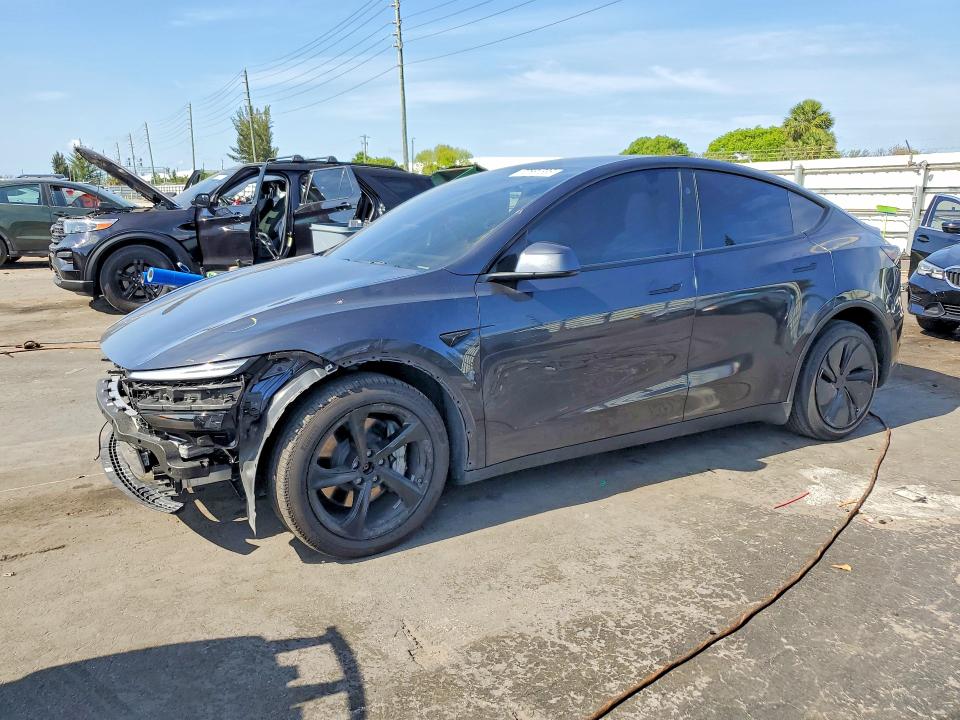 2026 Tesla Model y VIN 7SAYGDEE1TA388288 COPART salvage auction — FRONT END, Fl - Cert Of Title Slvg Rebuildable, sold $19,400 on 2026-07-13 (photo 1)