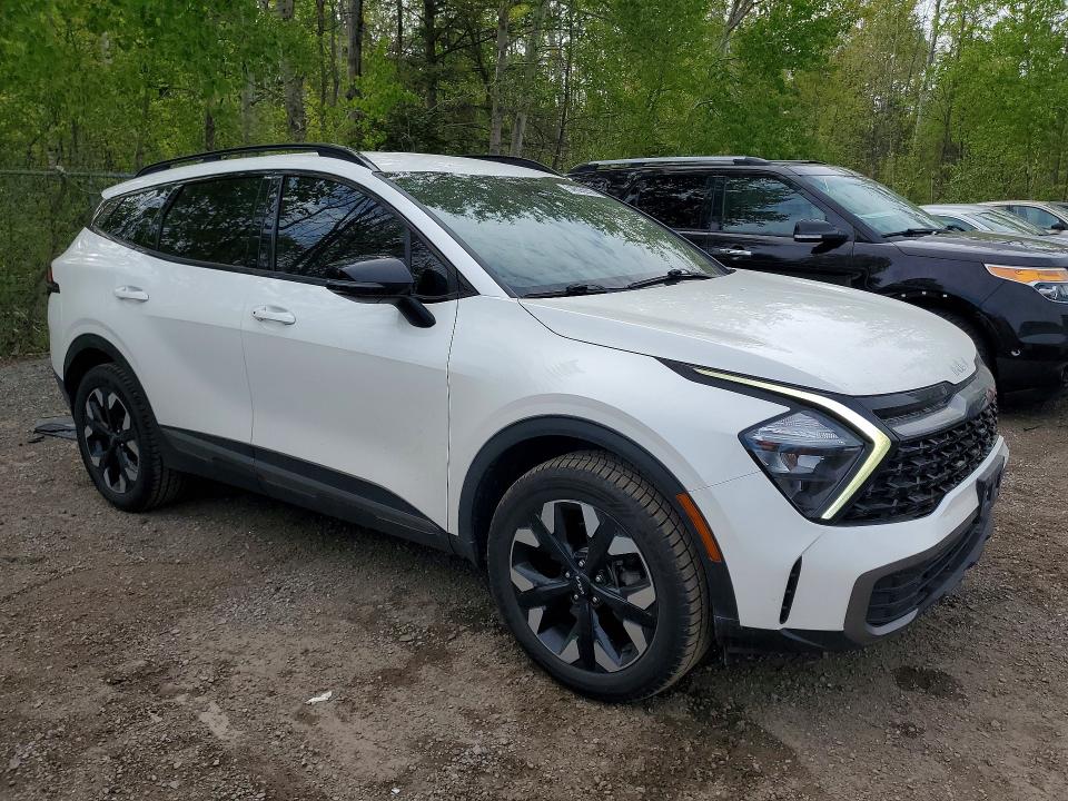 2023 Kia Sportage VIN KNDPUCAF9P7079564 COPART salvage auction — SIDE, On - Permit No Brand - Unfit, sold $9,900 on 2026-07-14 (photo 4)