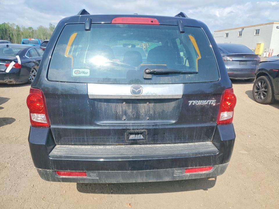 2011 Mazda Tribute VIN 4F2CY0C71BKM00946 COPART salvage auction — MINOR DENT/SCRATCHES, On - Permit No Brand - Unfit, sold $750 on 2026-07-03 (photo 6)