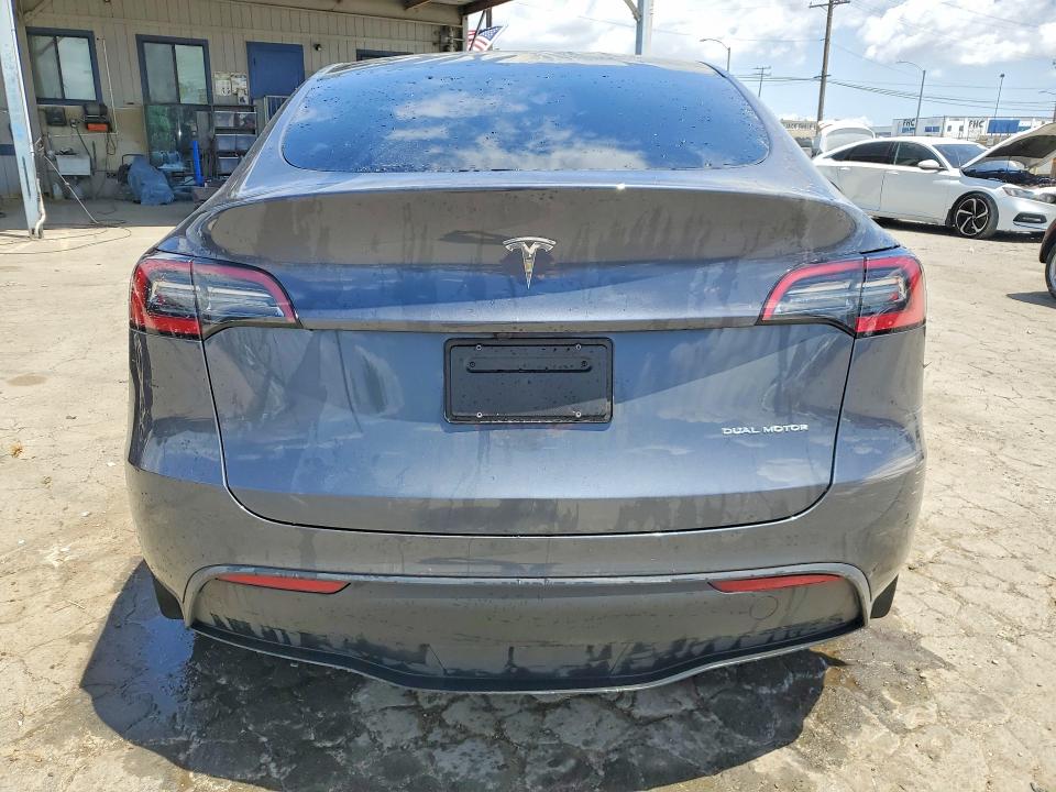 2023 Tesla Model y VIN 7SAYGDEE9PF915423 COPART salvage auction — FRONT END, Ca - Salvage Certificate, sold $10,400 on 2026-07-27 (photo 6)